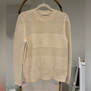 Tory Burch cream sweater.